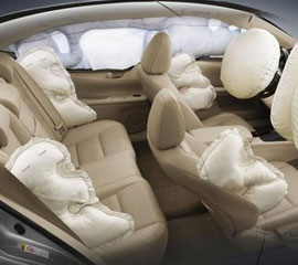 The inside of a vehicle with blown up airbags