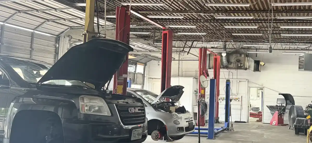 Beach Auto Repair service bay in Virginia Beach with technicians working on vehicles