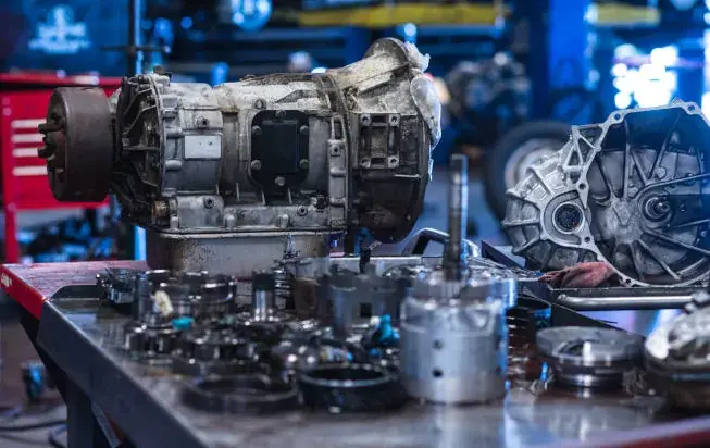 Transmission system being serviced with fluid change at Beach Auto Repair